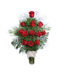 arrangement of roses with greenery